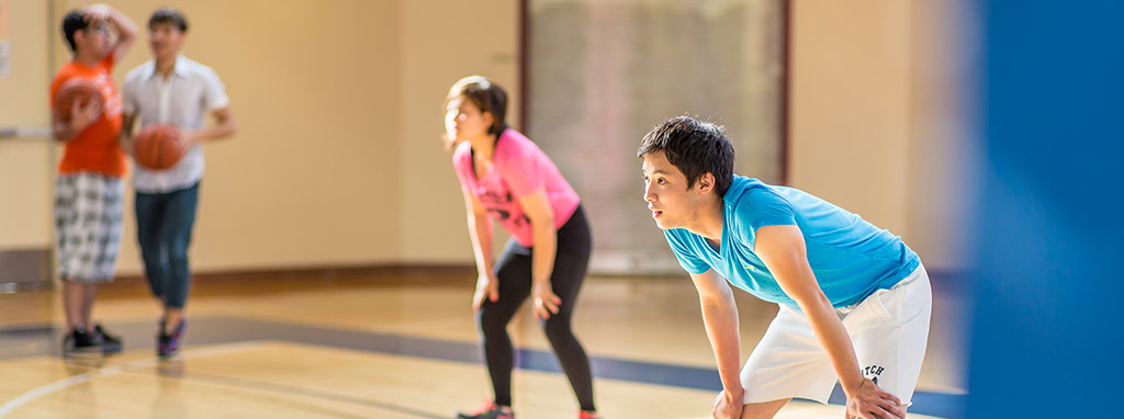  Students play basketball at the Wellness Center 