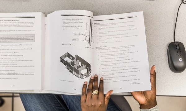 closeup of a book in a student's hand