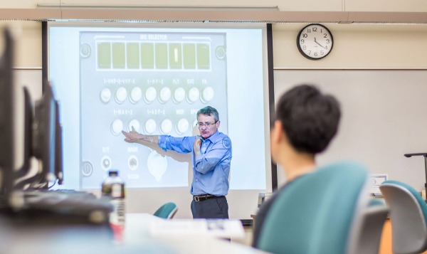 faculty member teaching in classroom