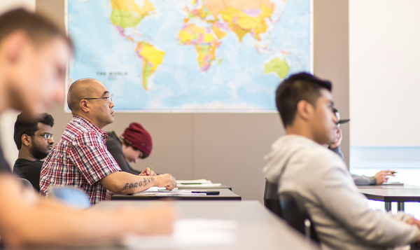 students take notes in classroom