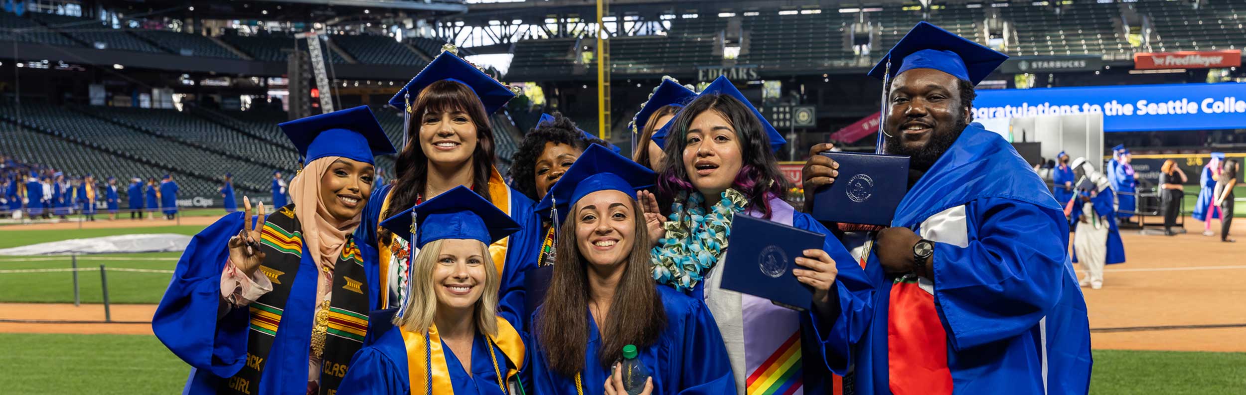 graduates in caps and gowns 