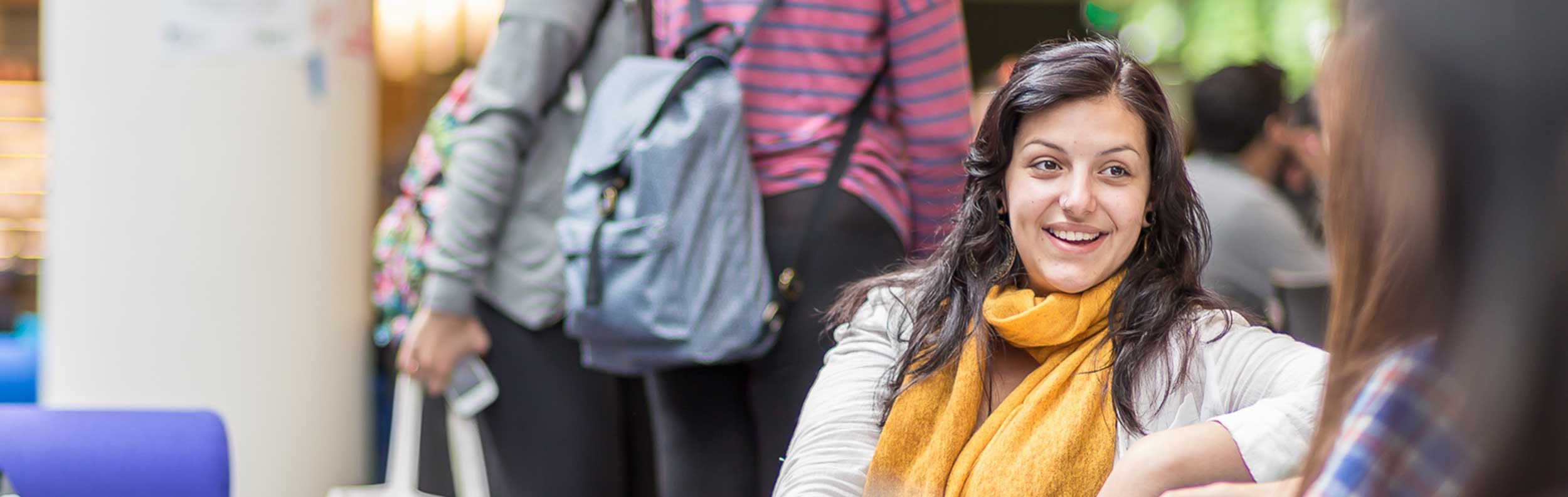  Female wearing a yellow scarf 